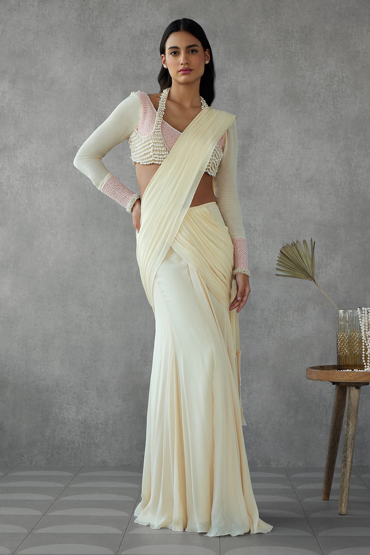 Cream Drape Saree Paired With Two Layer Thread Work & Dangling Pearl Embroidered Blouse