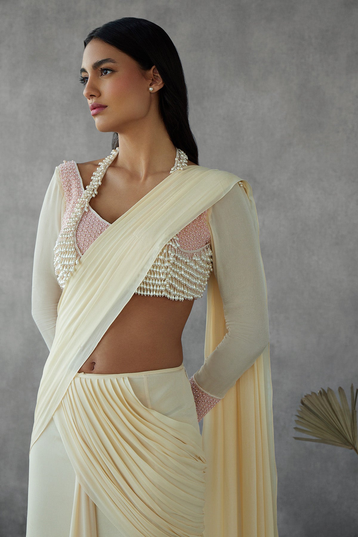 Cream Drape Saree Paired With Two Layer Thread Work & Dangling Pearl Embroidered Blouse