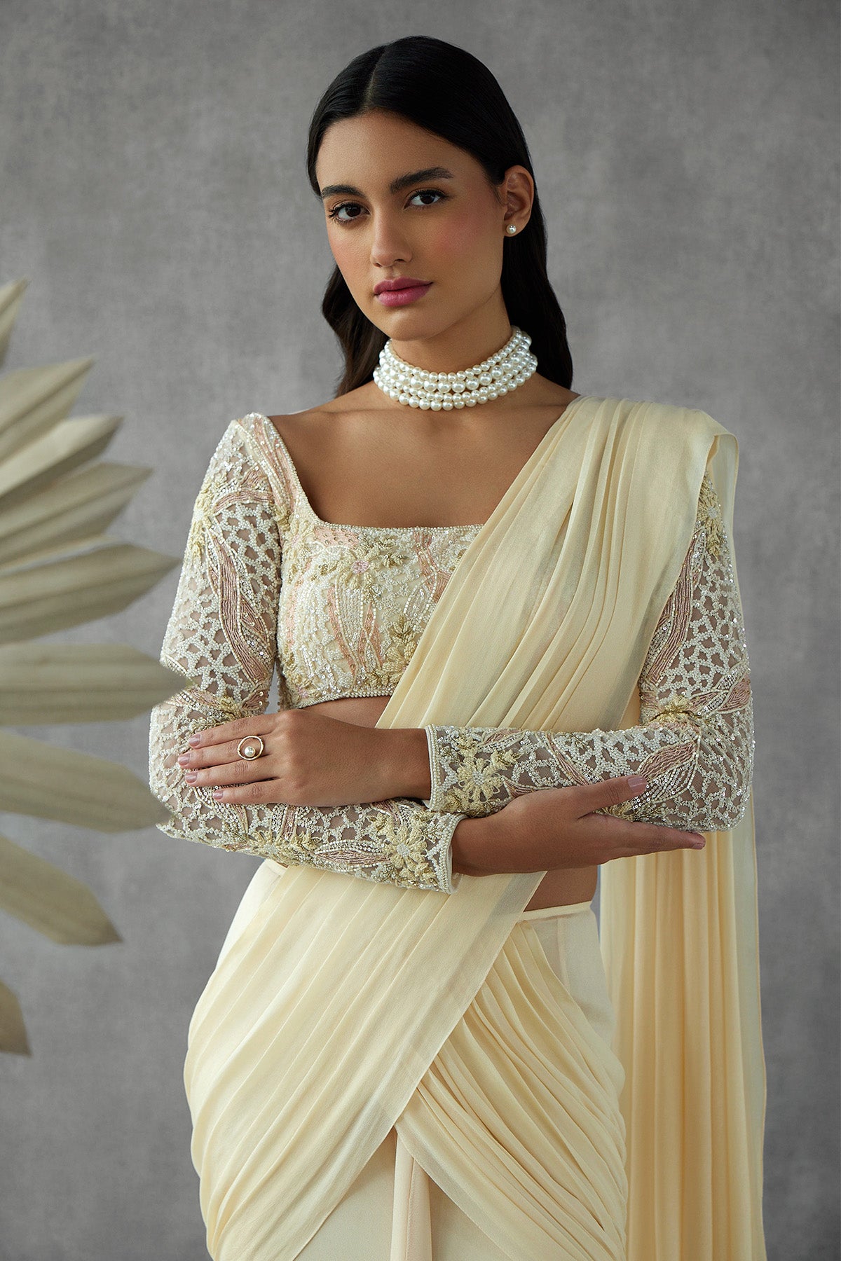 Cream Drape Saree Paired With Full Sleeve Embroidered Blouse