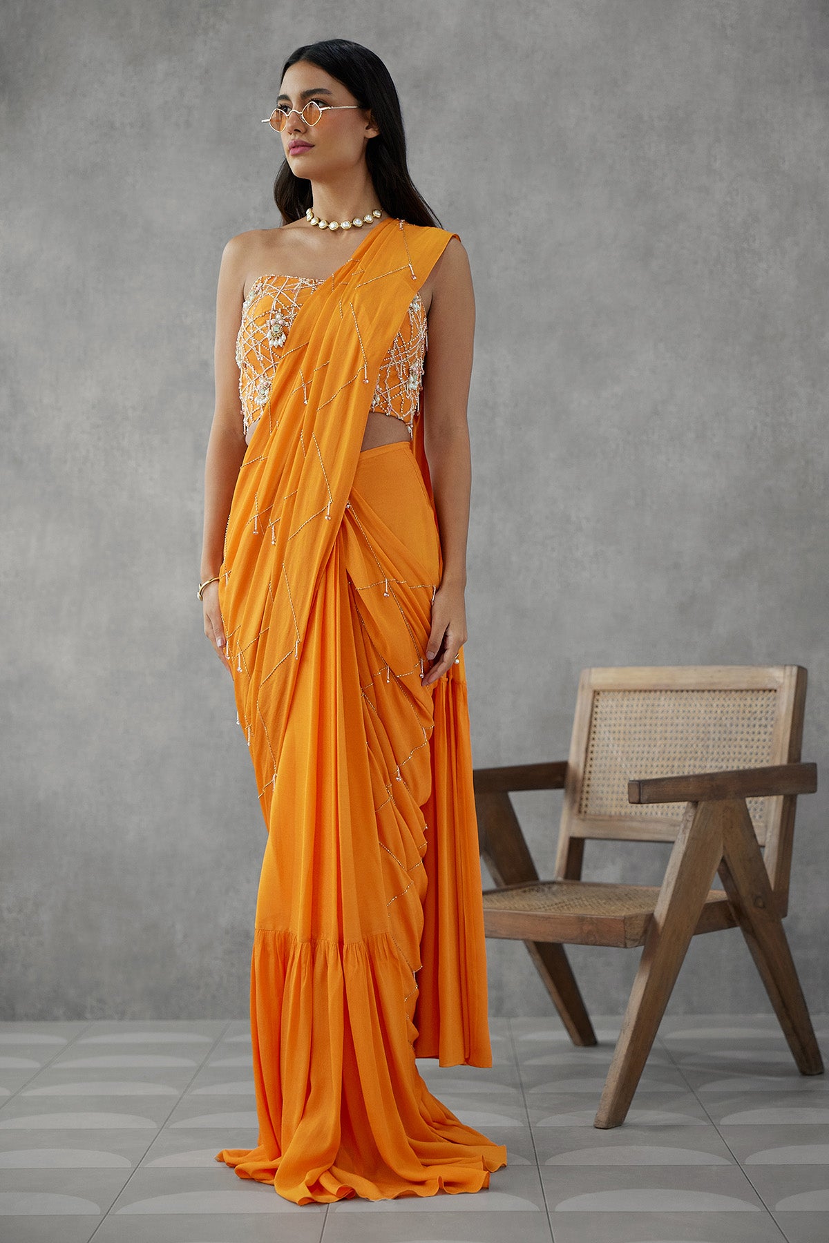 Saffron Orange Drape Saree With Corset Blouse