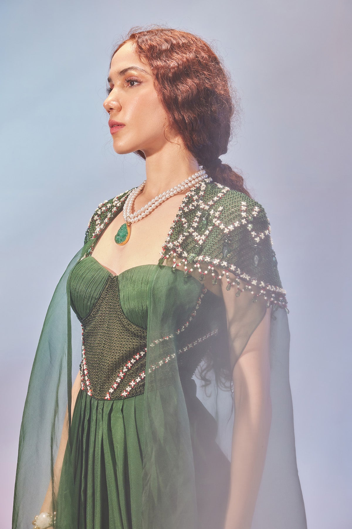 Corset style drape dress with shoulder embellished cape