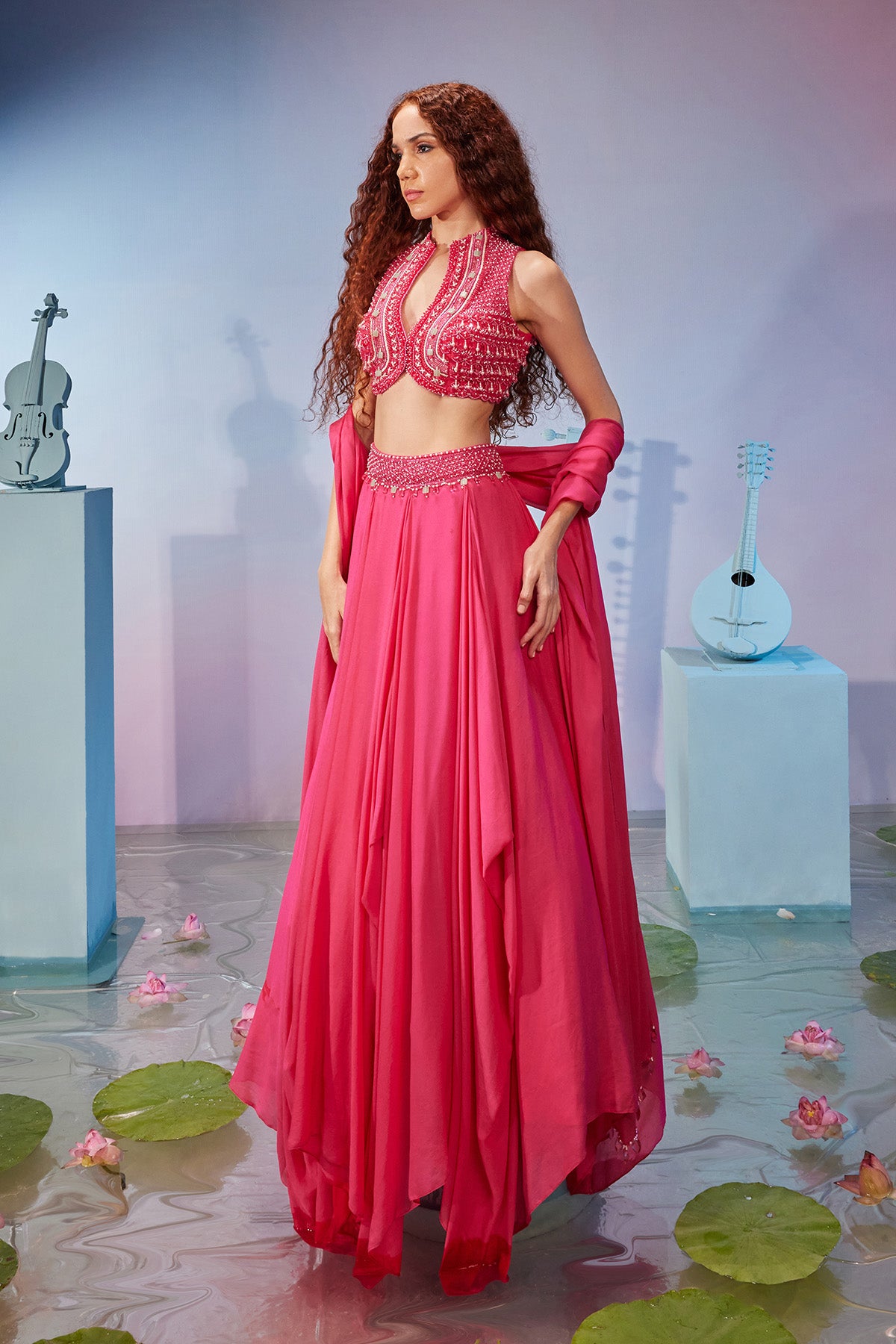 Jacket style blouse with draped lehenga