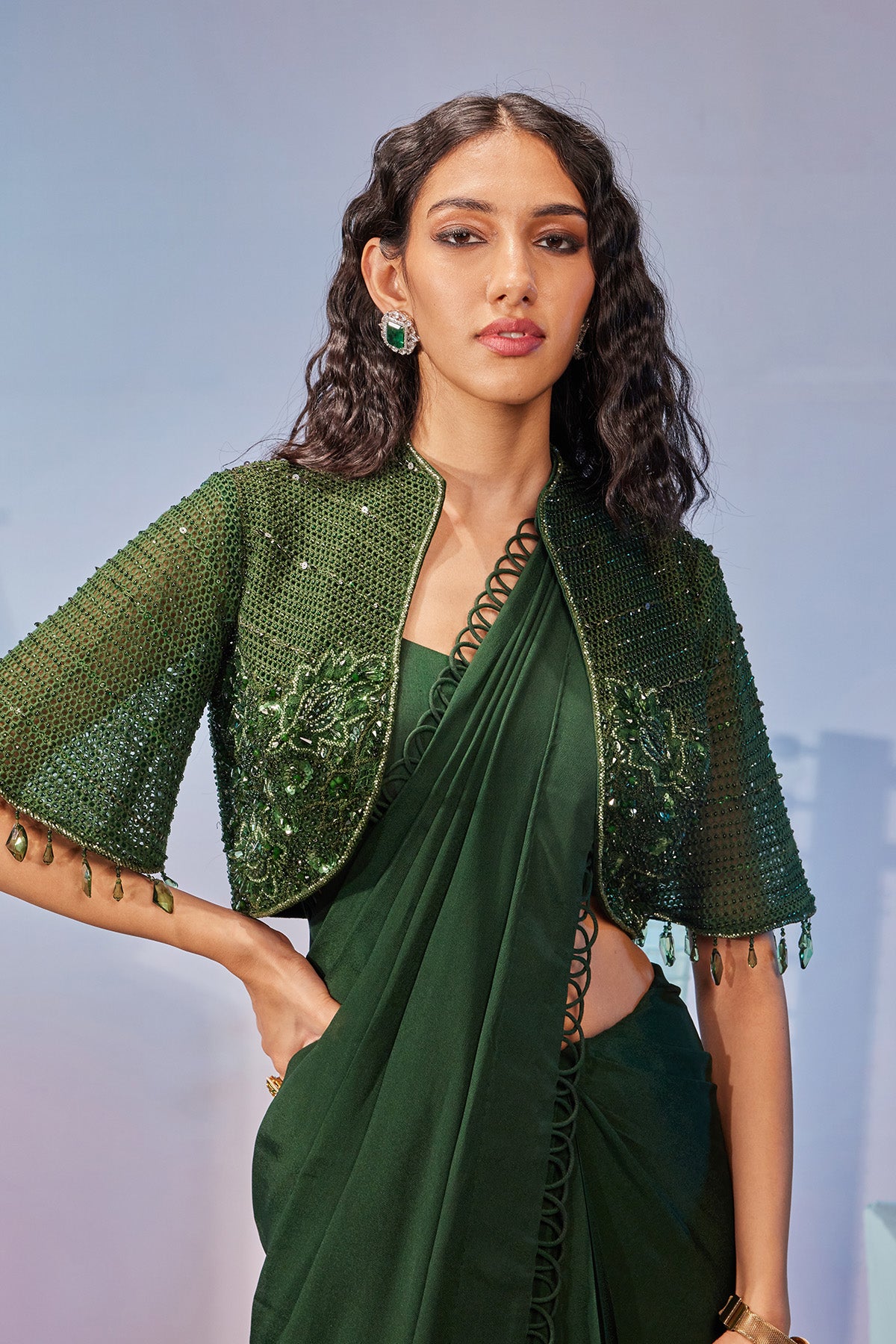 Jaal embellished jacket teamed with pre pleated saree