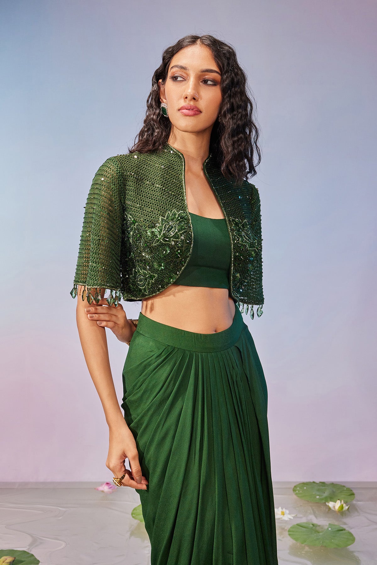 Jaal embellished jacket teamed with drape skirt & bustier