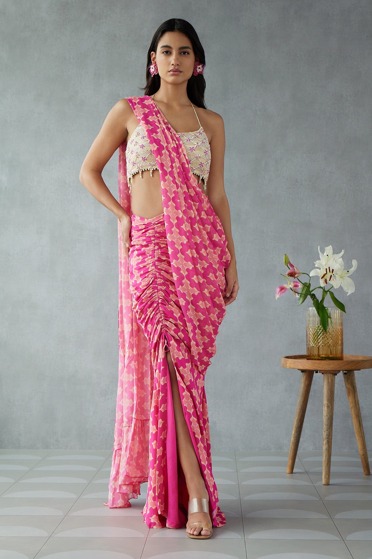 Knockout Pink Printed Saree Paired With Embroidered Blouse