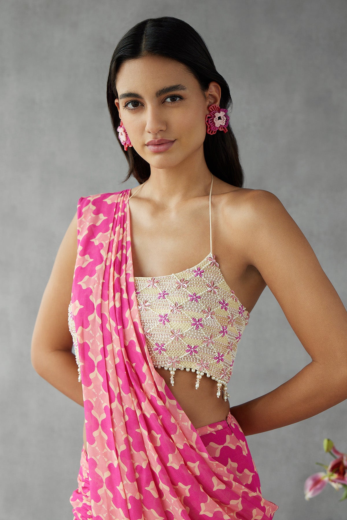 Knockout Pink Printed Saree Paired With Embroidered Blouse