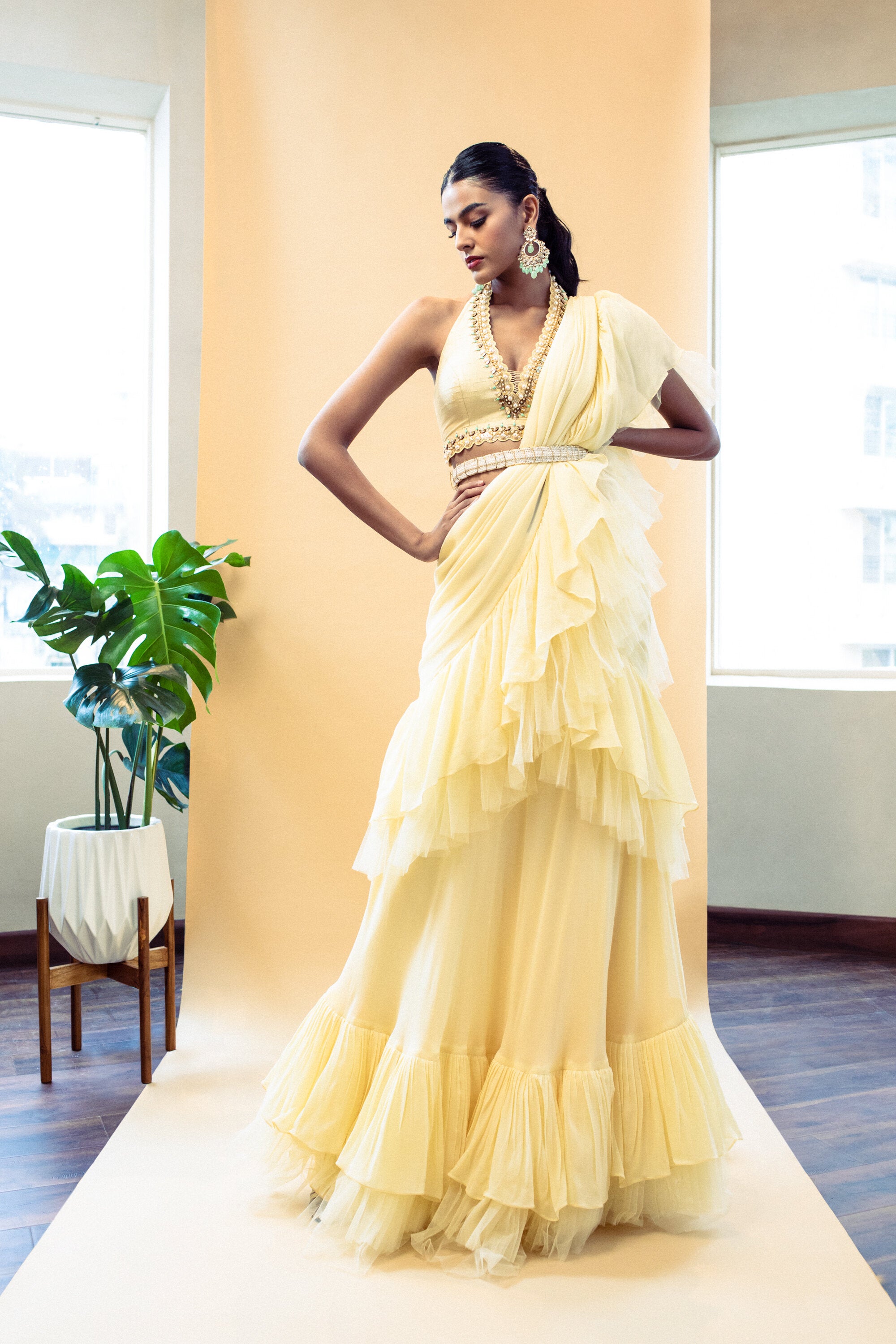⁠Yellow pre draped ruffle saree with embroidered blouse