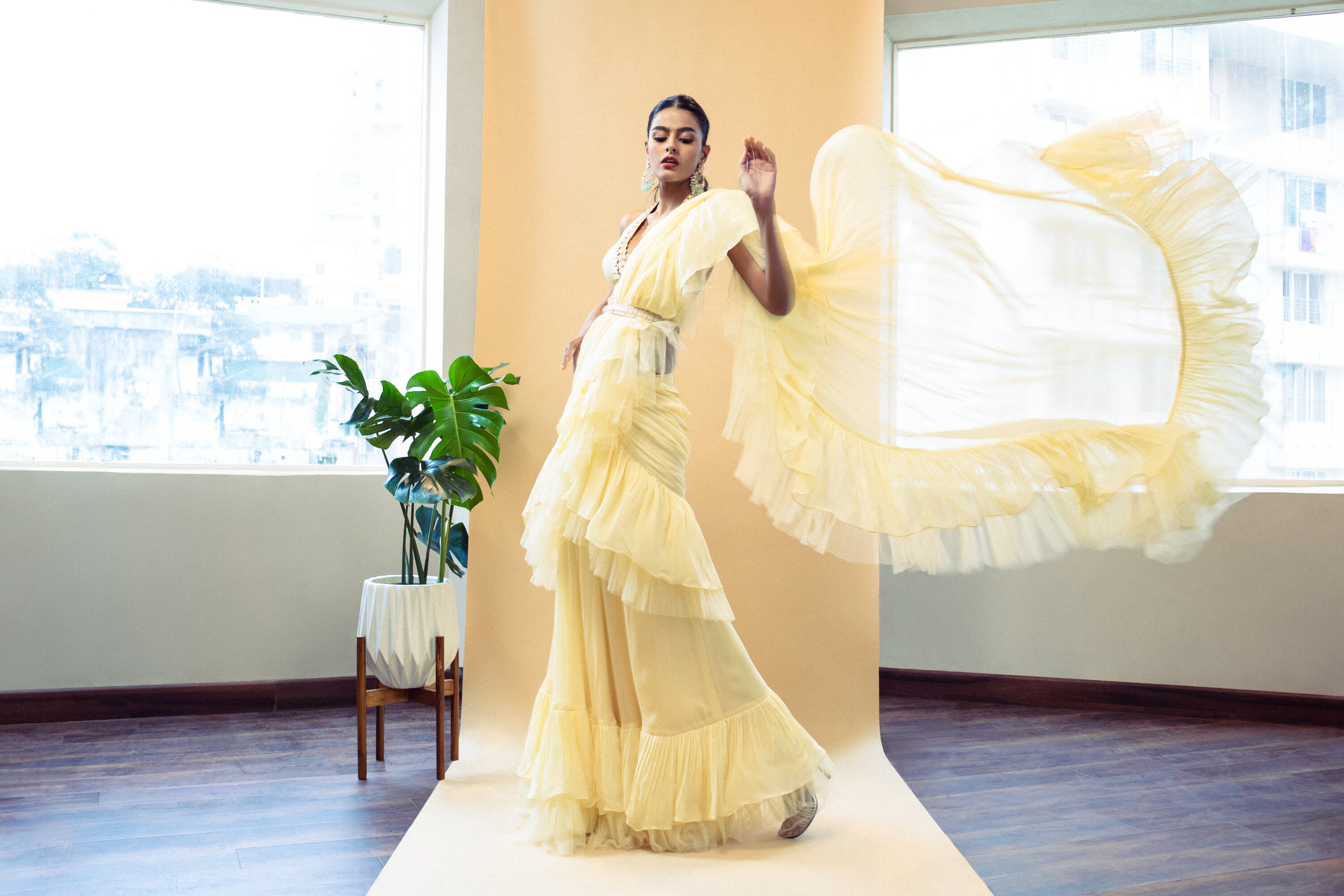 ⁠Yellow pre draped ruffle saree with embroidered blouse